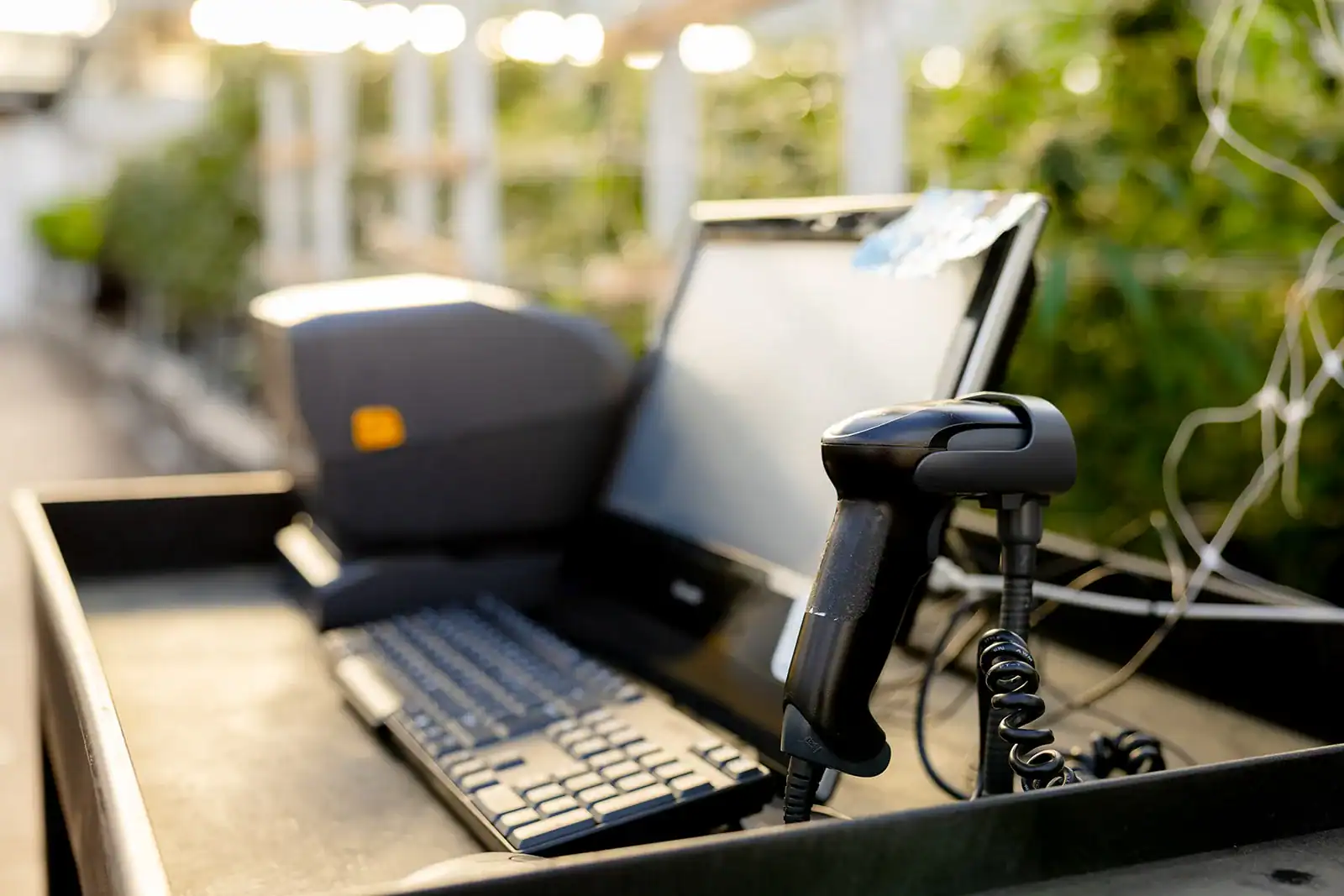 Barcode scanner and laptop on a packing desk